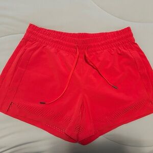 Athleta Baja Lasercut Hem Red shorts